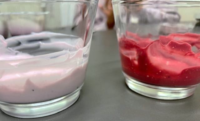 Two glass containers showing purple bacteria–based formulations with different textures and colours, illustrating formulation optimisation and stability of bioactive compounds.